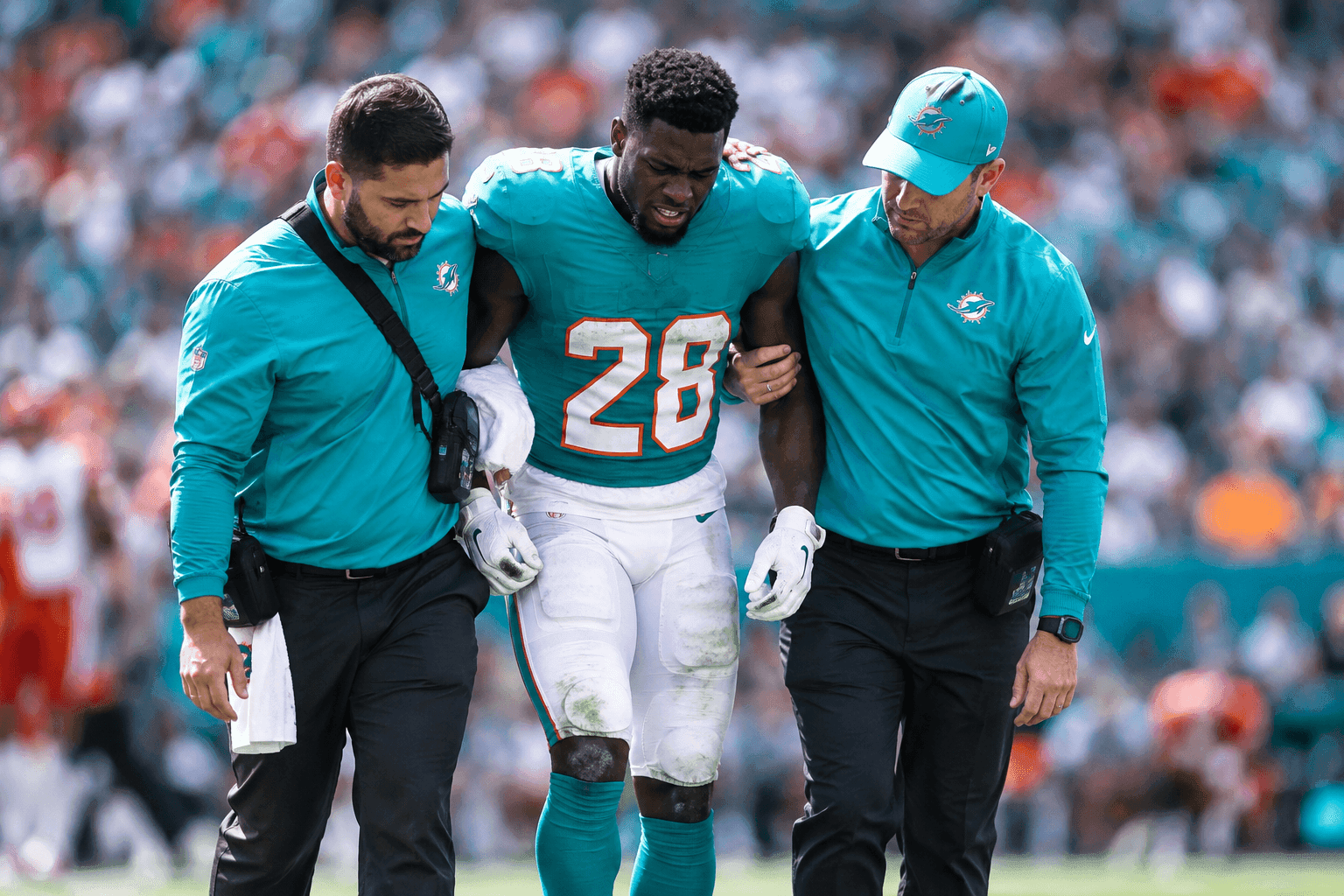 Editorial sports image for De'Von Achane Limps Off Against Chiefs, Sending Fantasy Managers Into a Panic