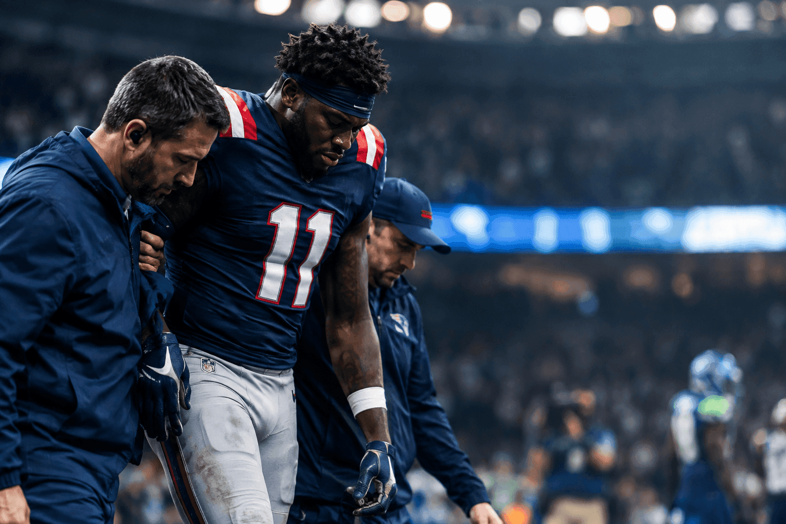Editorial sports image for AJ Brown's High-Ankle Sprain Turns Patriots' Opening Night from Bad to Worse