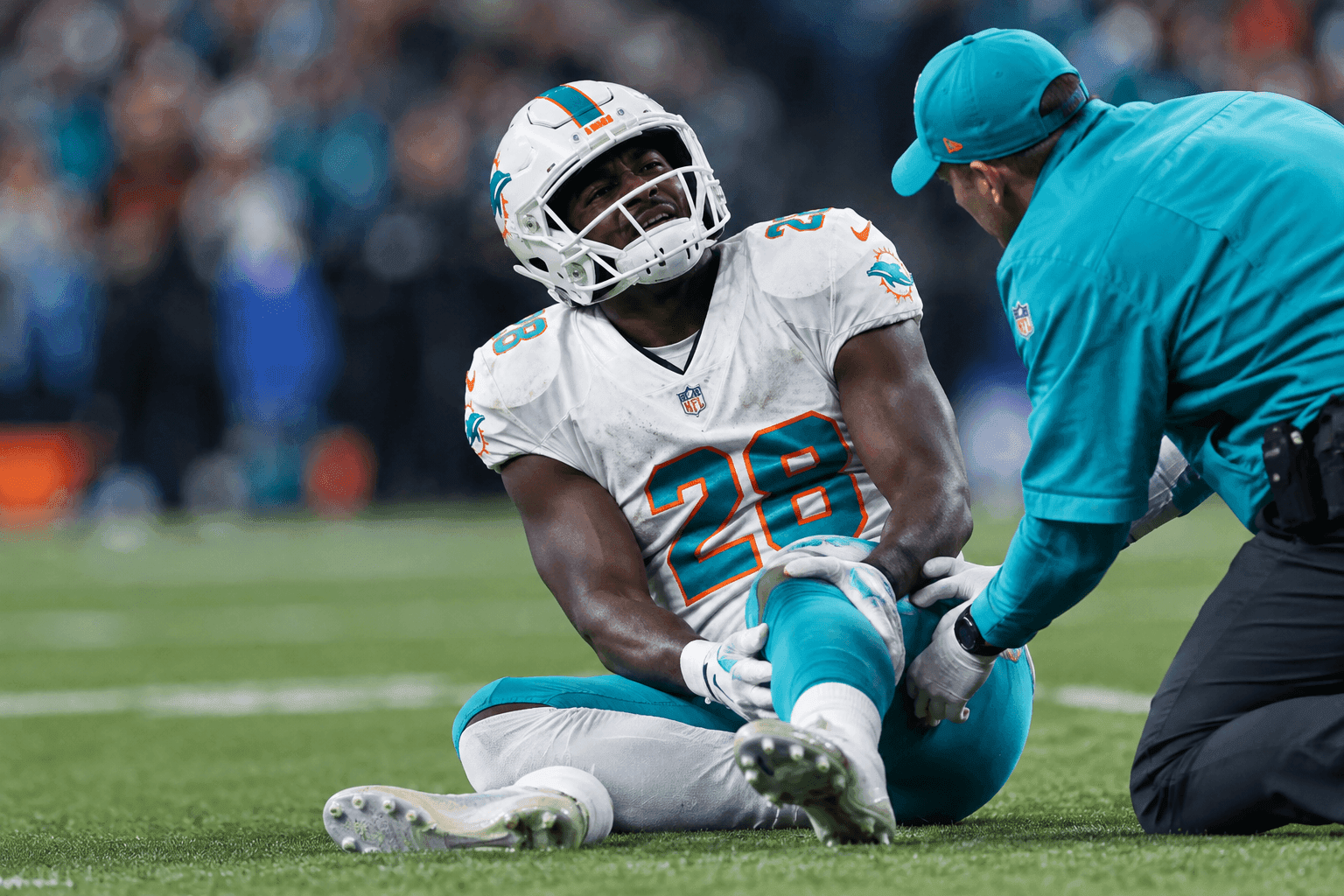 Editorial sports image for De'Von Achane's Torn ACL Officially Ends the Dolphins' Offensive Illusion