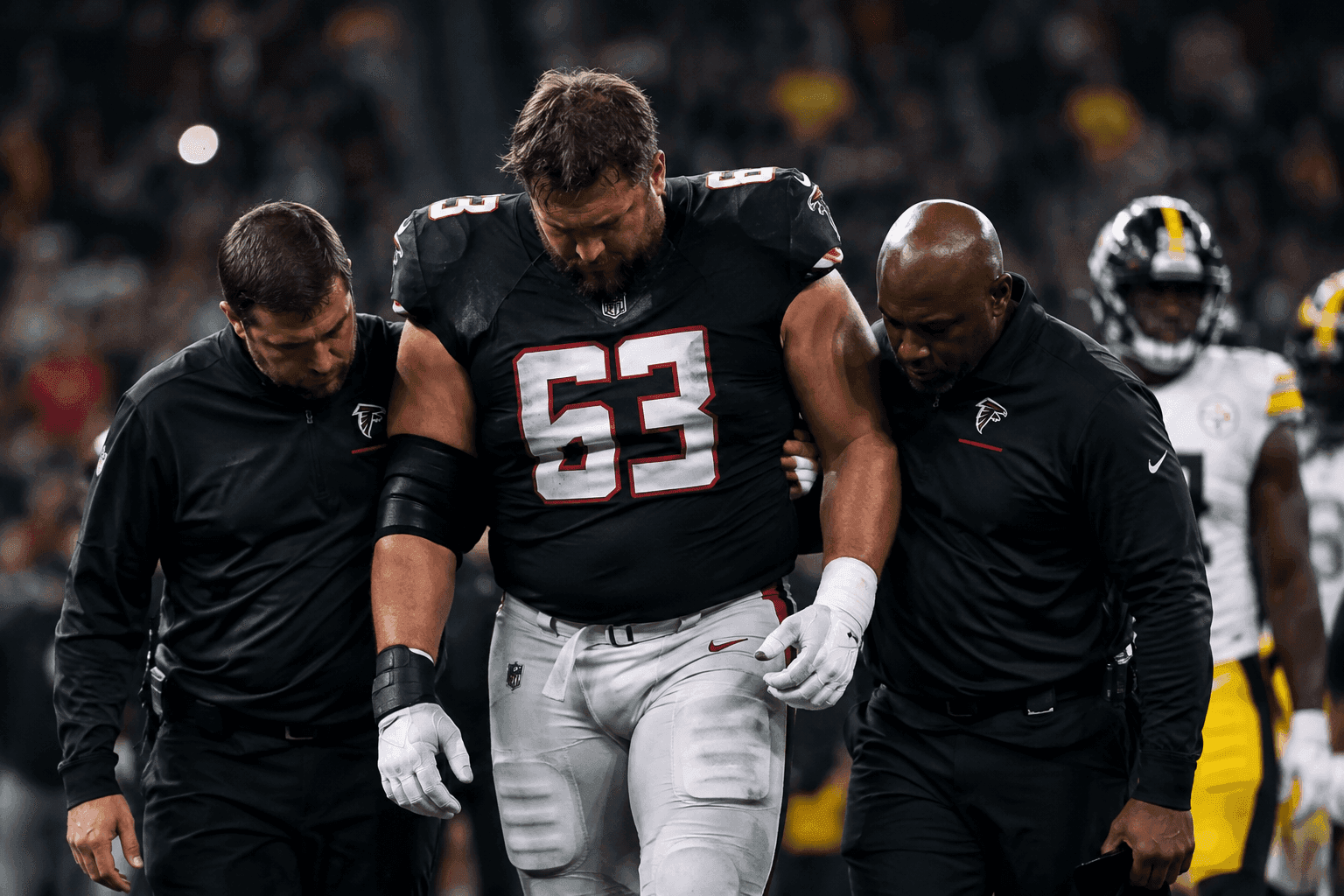 Editorial sports image for Falcons Lose Chris Lindstrom to Concussion Mid-Game Against Steelers