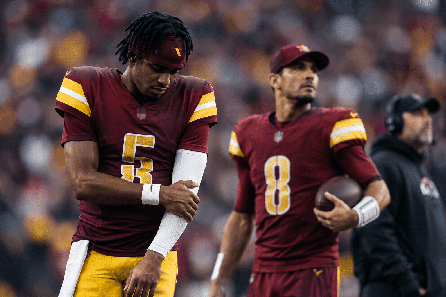 Editorial sports image for Jayden Daniels Dislocates Elbow Again, Forcing Commanders to 'Rally' Around Marcus Mariota